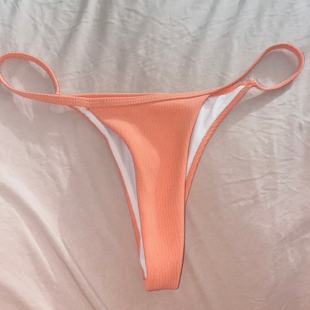 Coral colored thong bikini bottoms